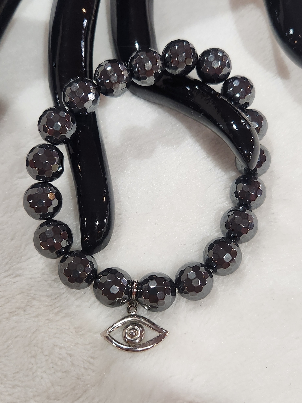 Hematite V3 Faceted Beads Stretch Bracelet with Silver Eye Charm